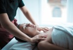 Selective Focus Photo of Woman Getting a Massage